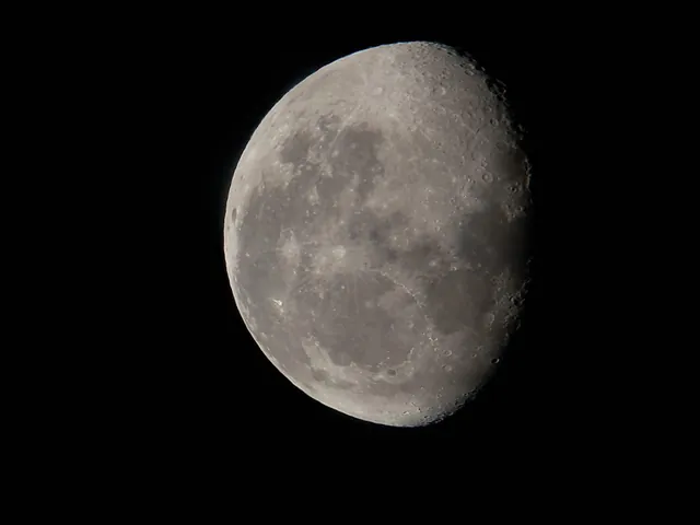 A close-up of the Moon, photographed on a stargazing night.