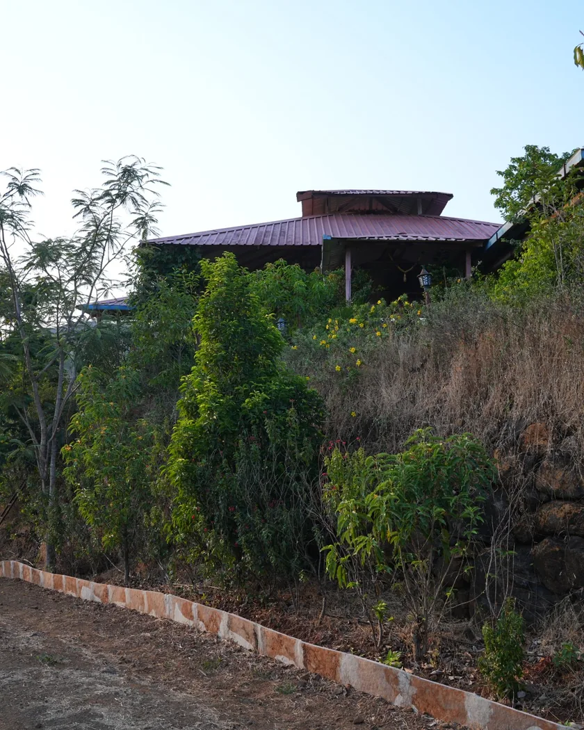 The dining area at the farm, above a terraced garden.